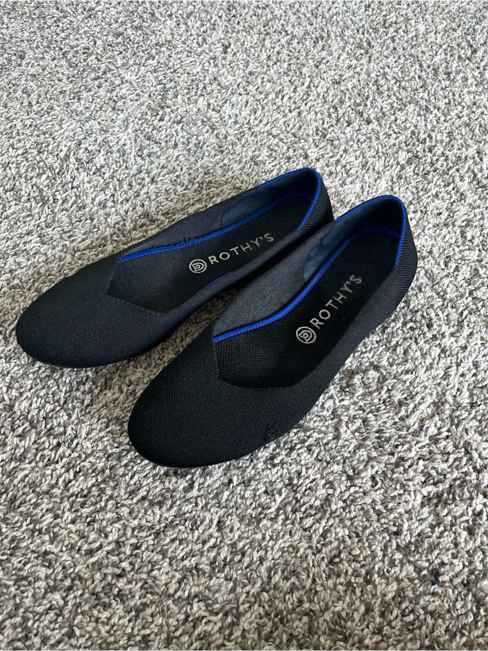 Well loved Rothy's Black Slip-On Flats